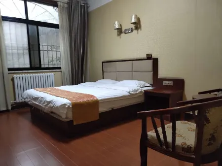 Xinbo Business Hostel Отели в г. Вэйнань