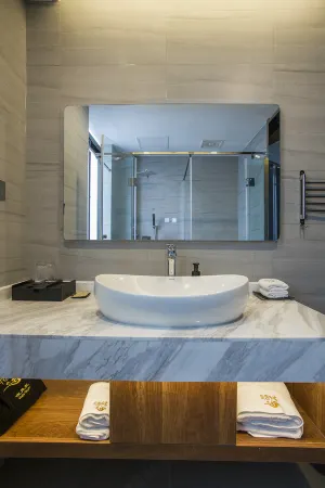 Wanqing Zhenyuan Hotel Отели рядом с достопримечательностью «Zhuyuwan Scenic Area»