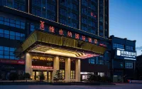 Vienna International Hotel (Guiyang Qingzhen Gaoyuan Mingzhu Junyueguoji) Hotel dekat Guizhou Child Junior Normal College