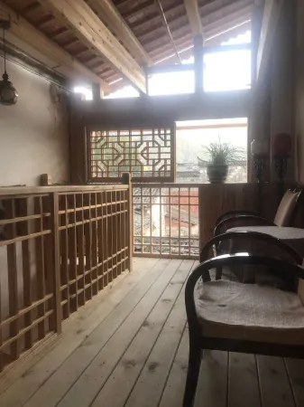 Riverside Warm Hostel Отели рядом с достопримечательностью «Mingqing Commercial Street»