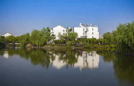 Merlinhod Ancient Town Resort Hotel (Xitang Baoding) Отели в г. Цзяшань