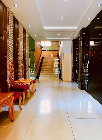 Shangju Hotel (Southeast Xihua Road) Отели рядом с достопримечательностью «Jianghe Relic Site»