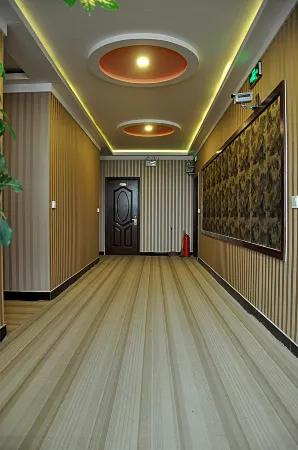 Youpeng Business Hotel Отели рядом со станцией Junanbei Railway Station