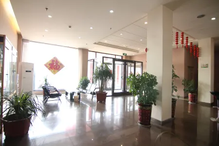 Thank You Junyi Inn Huozhou Gulou Отели рядом с достопримечательностью «Шэньси Государственная Безопасность»