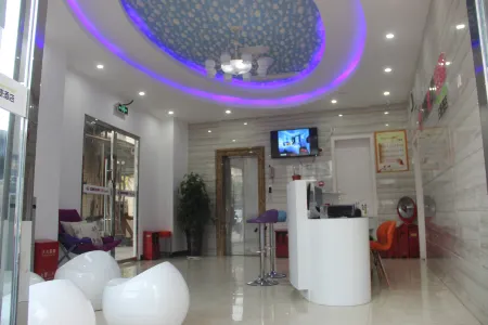 Lezhizhen'ai Theme Hotel Отели рядом с достопримечательностью «Tonglv Passenger Transport Terminal»