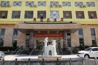 Jubao Hotel Отели рядом с достопримечательностью «Южная остановка пассажирского транспорта в Чжэцзе»