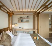 Xiuwenlongchangyi Hotel فنادق في شيو ون