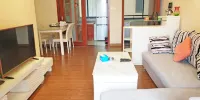 Ten Mile Silver Beach Holiday Apartment - Vista De Jardín De Tres Dormitorios