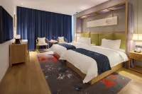 Qianna Hotel (Xinxiang Hualan Avenue Pangdonglai Shopping Plaza)