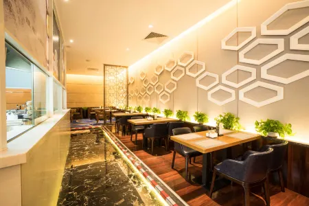 Brandi Hotel Отели рядом с достопримечательностью «Guangdong University of Business Studies»