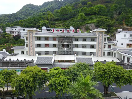 Jixiang Tiankeshe Hotel Отели рядом с достопримечательностью «Yearning Tea Plantation Tourist Attraction»