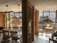 Jiuqi Xijiang Qijian Hostel - Yolcu Alma/Bırakma Hizmetleri