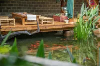 Puzhehei Yidu Homestay (Hehua Daguan Garden) Hotels in Qiubei