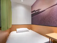 Changee Hotel (Shanghai Baoshan Wanda Gongkang Road Subway Station) Hotels near Sanquan Park