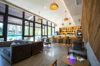 ANATOLE BY LANDISON LONGYOU GUANGHE LONGSHAN SPORTS HOTEL - bar