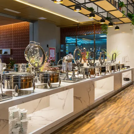 Nanyang Okey Elegant Style Hotel (Wanda Jianye Triumph Square Dushan Avenue Branch)