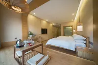 Manqigu Hotel - Inns
