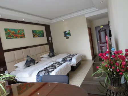 Binxing Holiday Hotel Отели рядом со станцией Luoping Railway Station