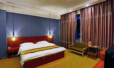 Shidian Jinma Theme Hotel Отели рядом с достопримечательностью «Qingniu Baima Square»