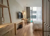 襄陽小隱壹宿民宿 鄰近湖北襄陽櫻為浪漫智能家居體驗館（浩然文化街店）的酒店