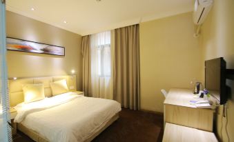 The bedroom features a double bed and a large window, with an adjacent bathroom that includes a bathtub and a separate shower at Fish Inn (Shanghai East Nanjing Road)