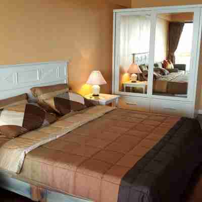 ซันไชน์ บีช คอนโดเทล บาย คมทนา Rooms