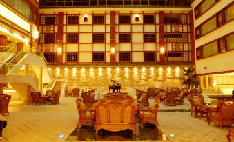 Lijiang Lvyun Holiday Hotel (Gucheng District Government Lijiang Ancient City Branch) - Housity
