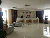 Quwo Dexin Business Hotel