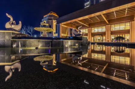 Grand New Century Hotel Отели рядом со станцией Changxing Railway Station