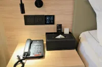 Yating Hotel (Rizhao Station RT Mart Branch)