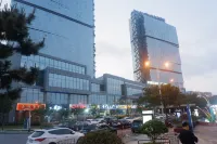 Qingdao Yuehai Time Apartment (City Balcony Happy Bay Shop)