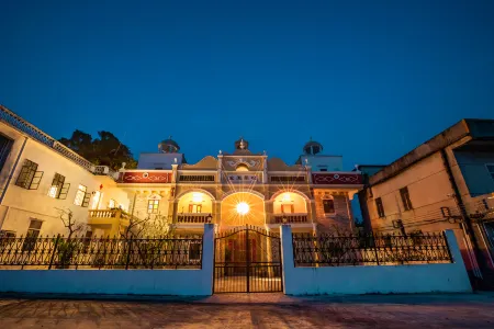 Xuantan Yuanshe Hotel Отели рядом с достопримечательностью «Xincun Gymnasium»