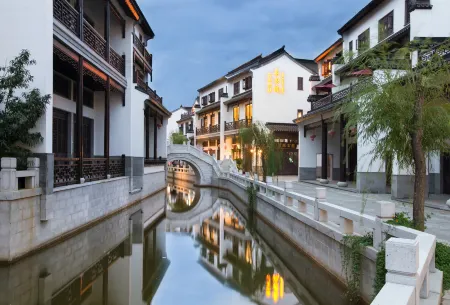 The happy home Отели рядом с достопримечательностью «Honghe Nativeland»