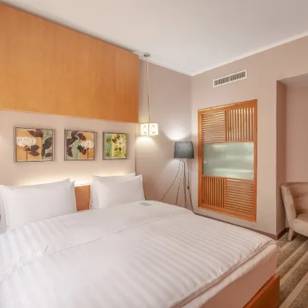 Ramada by Wyndham Ulaanbaatar Citycenter Отели рядом с достопримечательностью «Монгольский национальный исторический музей»