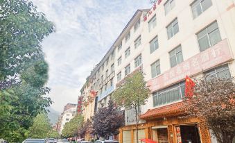 Longnan Tianchen Business Hotel - Housity