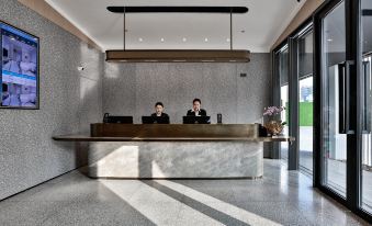 Meijin All Suites Hotel