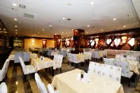 Yijing Shuigong Hotel - servizio colazione
