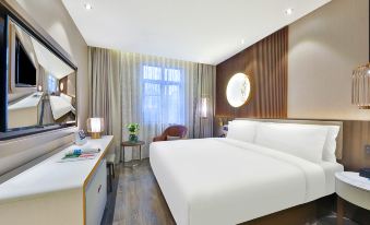 Orange Shanghai Longbai New Village Subway Station Hotel