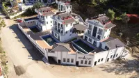 موناستري سويتس هوتل Hotels near Fly Infinity Tandem Paragliding Yamaç Parasutü