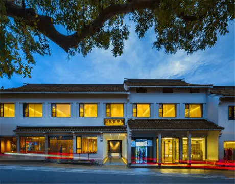 Xilei Baotuo Xingshe Hotel