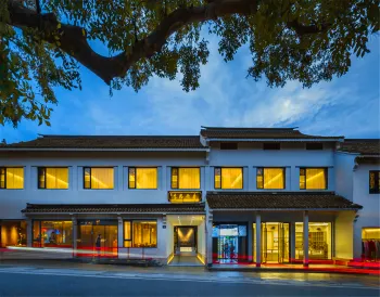 Xilei Baotuo Xingshe Hotel