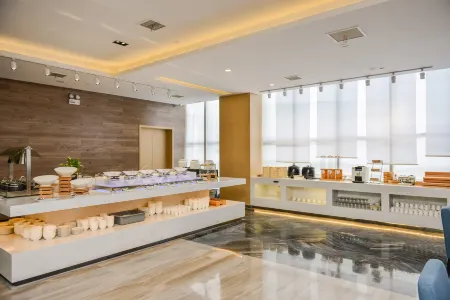 Borrman Hotel (Jining Rencheng Guanghe Road) Отели рядом с достопримечательностью «Jining Indoor Stadium»