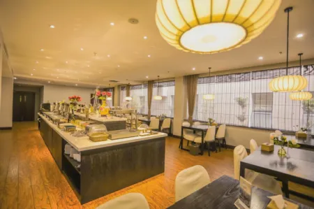 Kangle Mumianwan Hotel Отели в г. Пичжоу