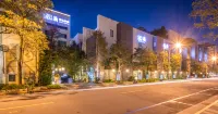 Mulan City Villa Motel Hotell i 