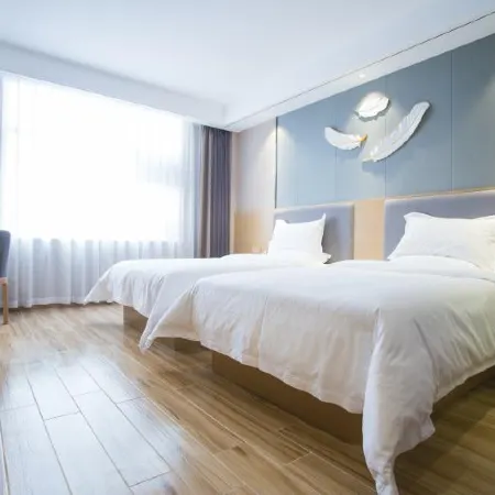 Chuxing Xinxuan Hotel (Lichuan Central Passenger Transport Dongfangcheng)