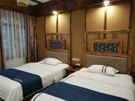 Huaisu Inn Отели в г. Цзишоу