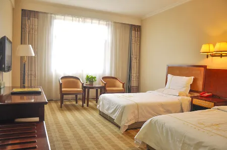 LongMen Plaza Отели рядом с достопримечательностью «Jiulong Temple»