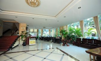 Mengla Xinhai Business Hotel