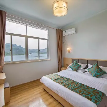 Wuyishan Xishuirenjia (Jiuquxi Wharf Store) Отели рядом с достопримечательностью «Девять треугольных дрейфов»