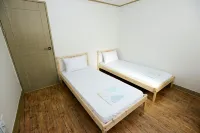 Jeju Masil Guesthouse - Pensions